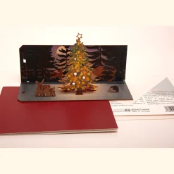 Waschbär Pop Up-Holzpostkarte »Weihnachten im Wald«. Hot