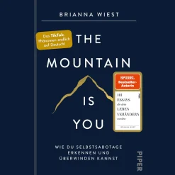 Waschbär The Mountain Is You. Wie du Selbstsabotage erkennen und überwinden kannst.